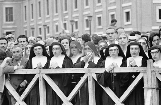 A group of mournful nuns in St. Peter's Square